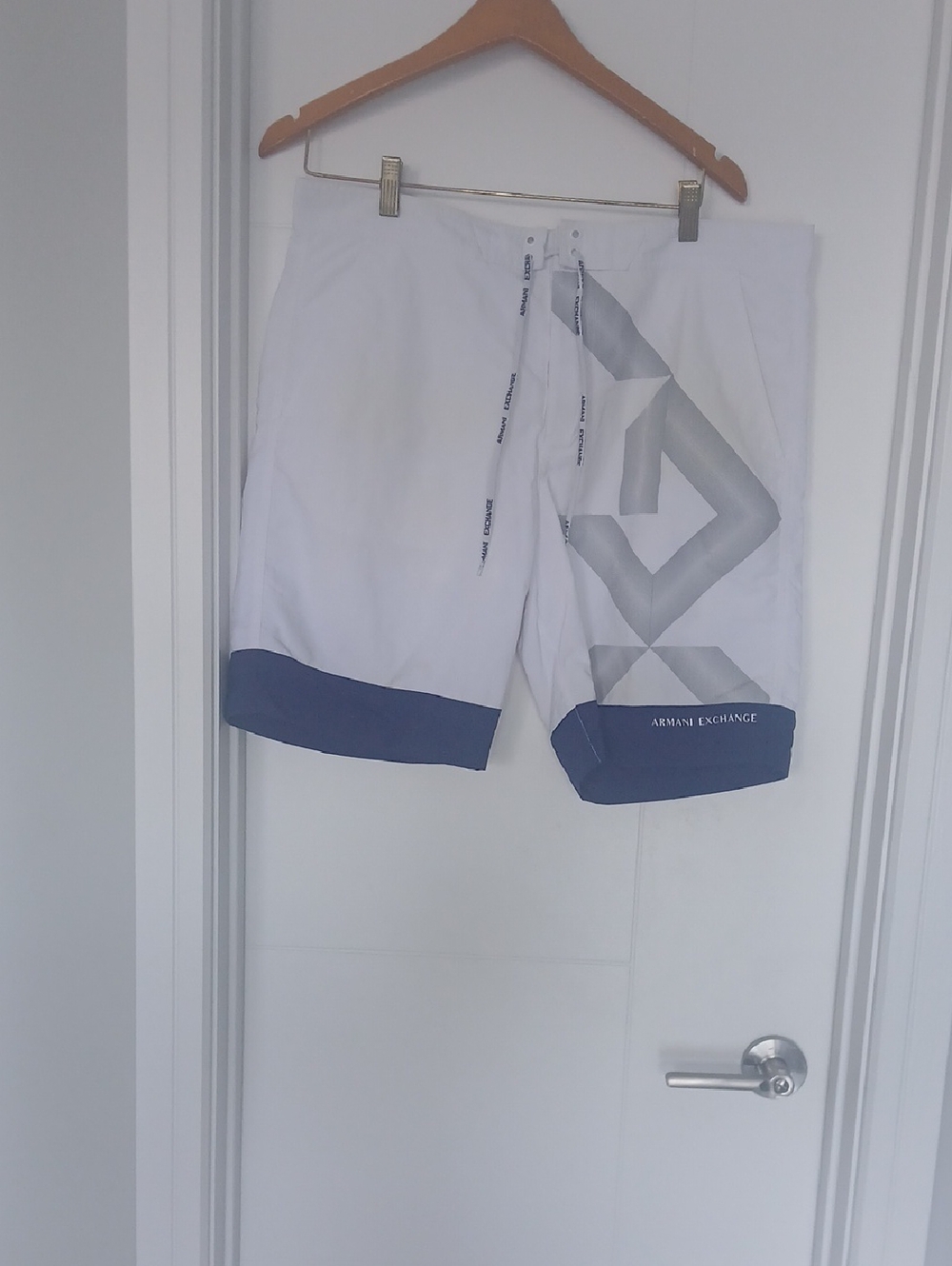 Armani Exchange White Swim Shorts with Navy Hem and Silver Graphic